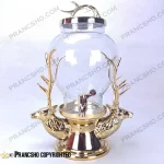 کلمن شیشه‌ای با پایه دو گوزن آلومینیومی طلایی براق ضد اسید