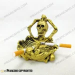 زیرسیگاری دایره‌ای پلی استری طلایی طرح جمجمه